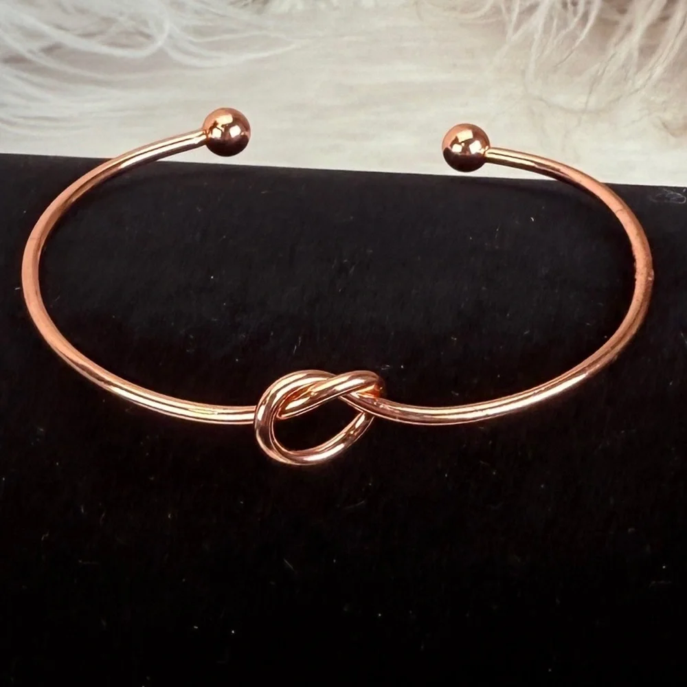 Pretty rose goldtone knotted minimalist cuff bracelet